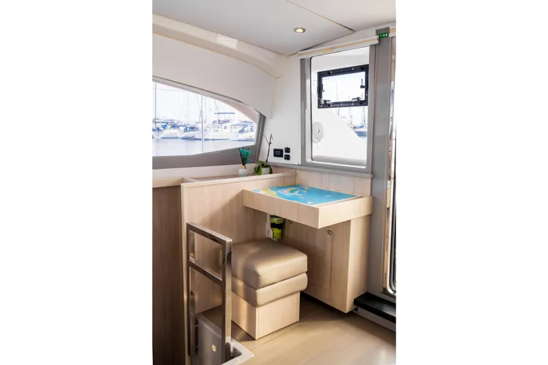 Everything Zen Yacht Photos Pics 2017 Leopard 40 yacht interior with navigation station and window view.