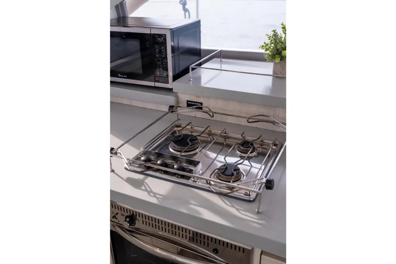 Everything Zen Yacht Photos Pics Modern kitchen in 2017 Leopard 40 yacht with stove and microwave.