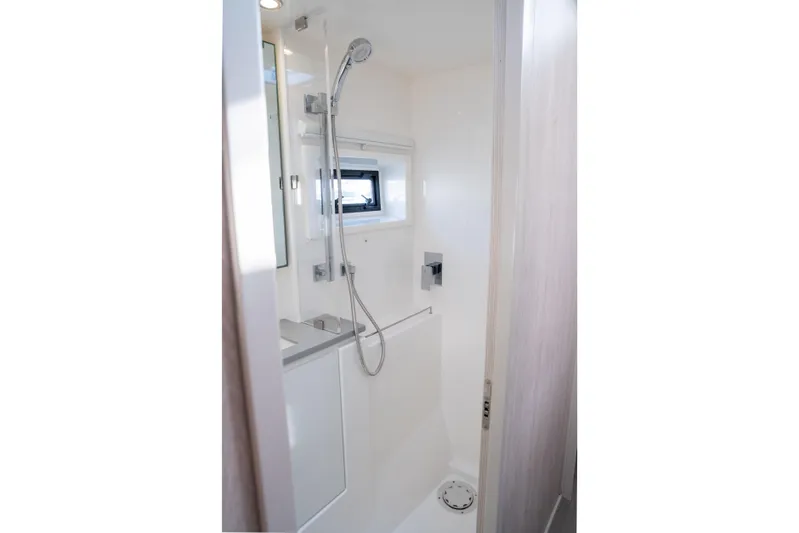 Everything Zen Yacht Photos Pics Modern bathroom in 2017 Leopard 40 yacht with shower and window.