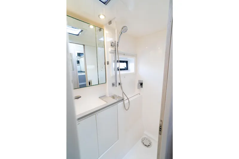 Everything Zen Yacht Photos Pics Modern bathroom in 2017 Leopard 40 yacht with shower and mirror.