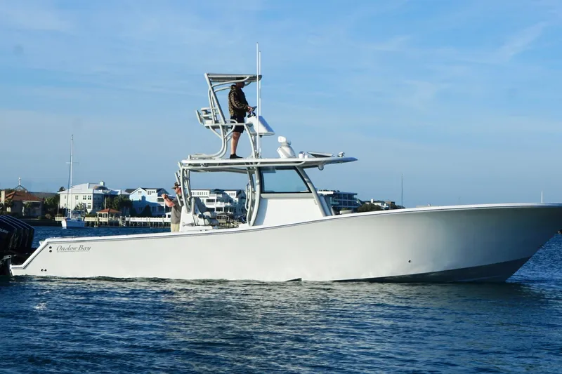  Yacht Photos Pics 2025 Onslow Bay 41 Tournament boat cruising on calm waters.