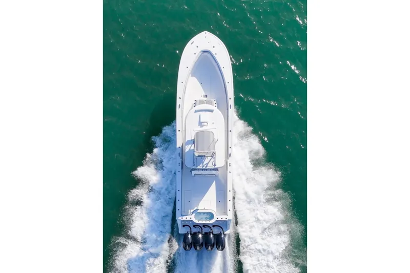  Yacht Photos Pics Aerial view of 2025 Onslow Bay 41 Tournament boat cruising on open water.
