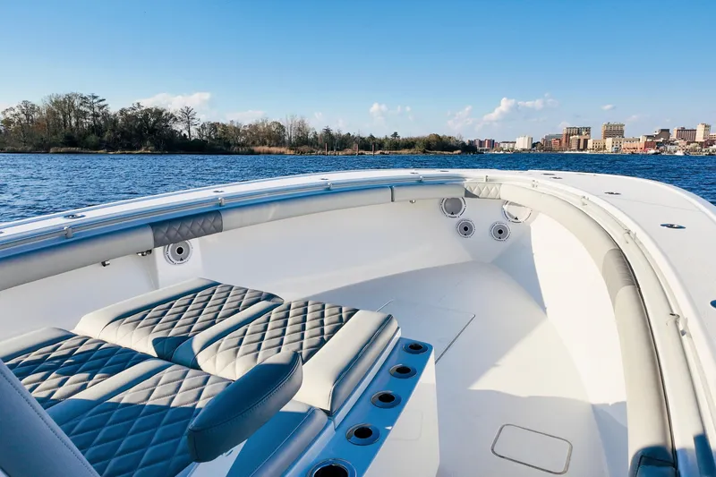  Yacht Photos Pics 2025 Onslow Bay 41 Tournament boat interior with quilted seating on a sunny day.