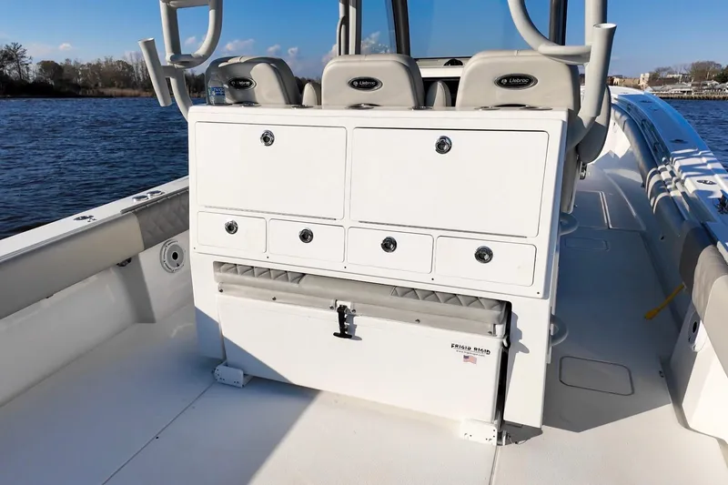  Yacht Photos Pics 2025 Onslow Bay 41 Tournament boat interior with storage compartments and seating.