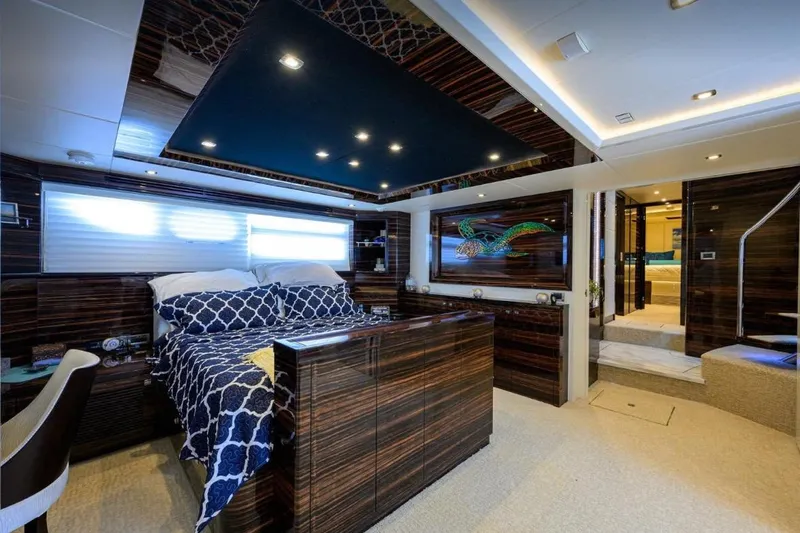  Yacht Photos Pics Luxurious 2014 Hampton Fly yacht bedroom with elegant wood paneling and modern decor.