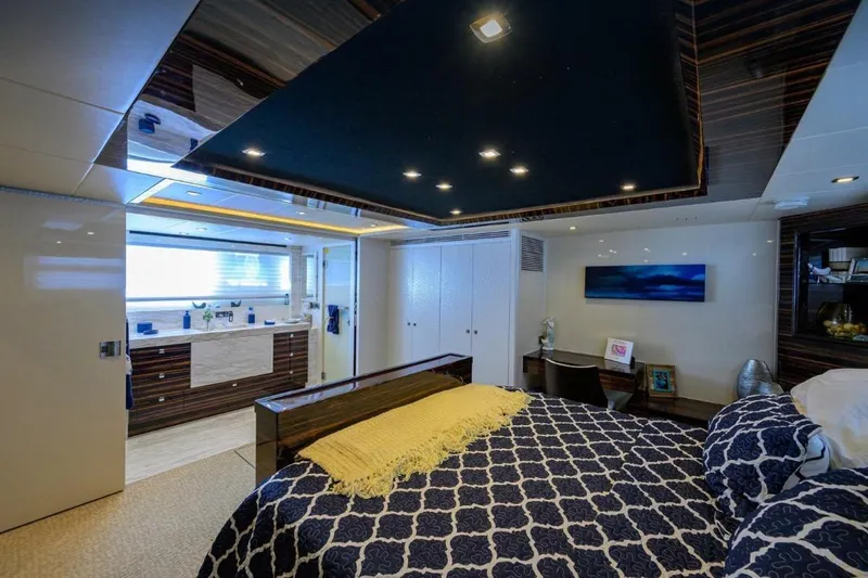  Yacht Photos Pics Luxurious 2014 Hampton Fly yacht bedroom with modern decor and elegant furnishings.