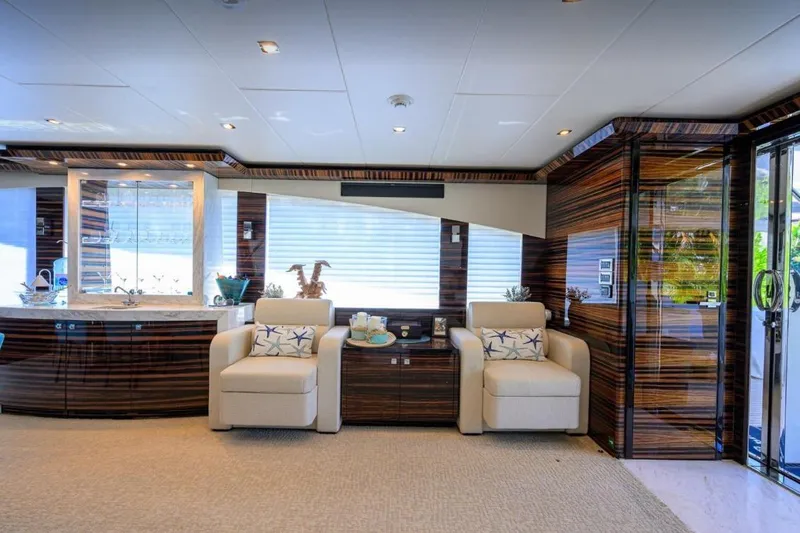  Yacht Photos Pics Luxurious interior of 2014 Hampton Fly yacht with elegant seating and modern decor.