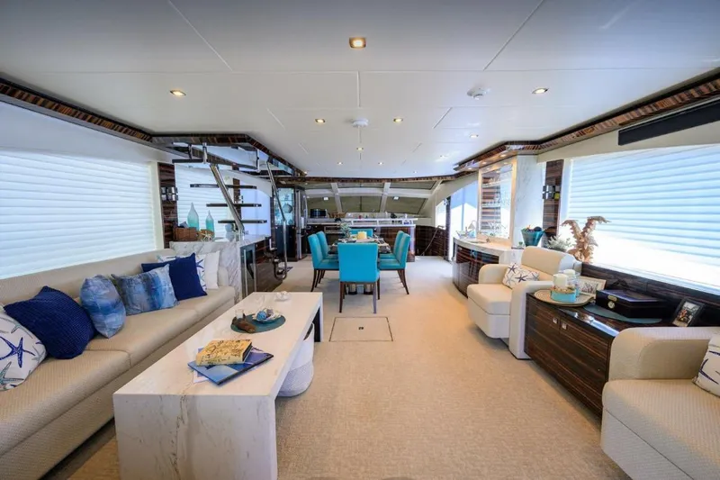  Yacht Photos Pics Luxurious interior of 2014 Hampton Fly yacht with elegant seating and dining area.