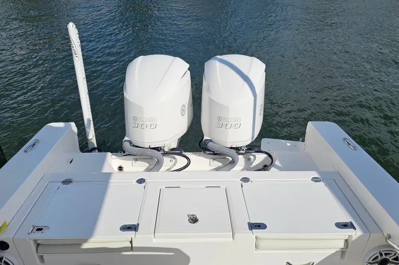  Yacht Photos Pics 2021 Everglades 273 Center Console with dual Yamaha 300 engines on water.