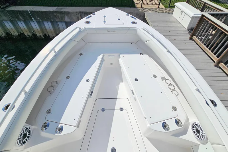  Yacht Photos Pics 2021 Everglades 273 Center Console boat with spacious deck and seating area.
