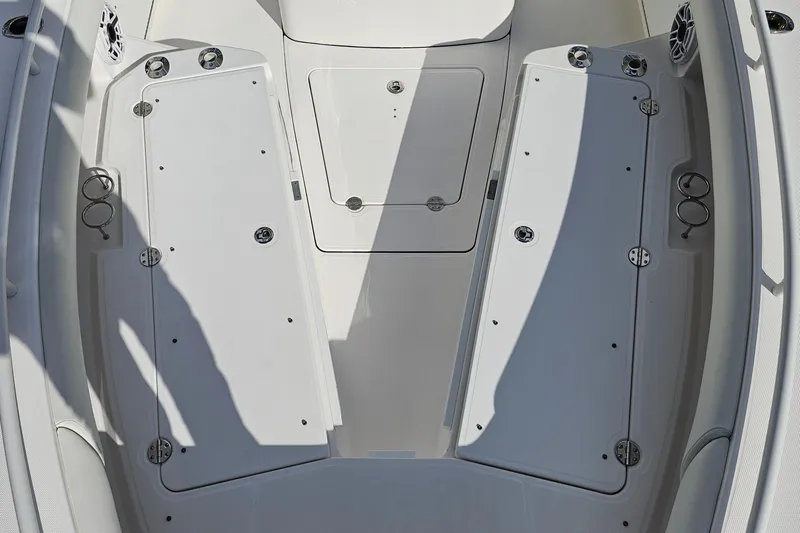  Yacht Photos Pics 2021 Everglades 273 Center Console boat deck with storage compartments and cup holders.