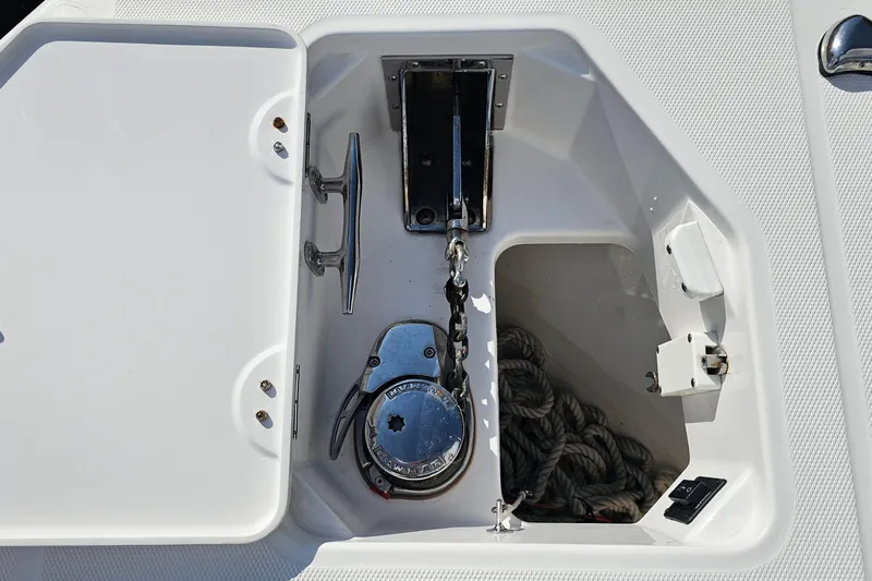 Yacht Photos Pics Anchor compartment of 2021 Everglades 273 Center Console boat with rope and winch.