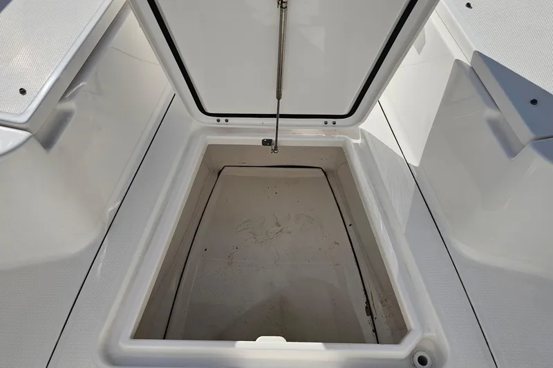  Yacht Photos Pics Open storage compartment on 2021 Everglades 273 Center Console boat.