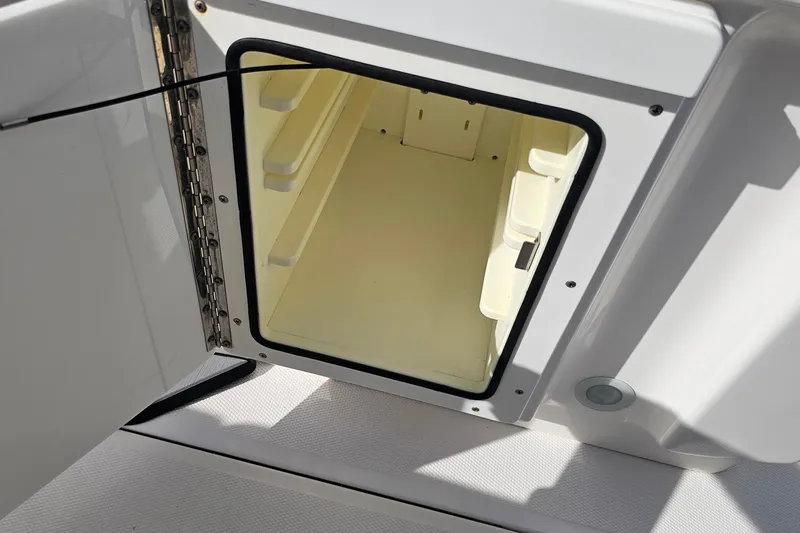  Yacht Photos Pics Open storage compartment on 2021 Everglades 273 Center Console boat.