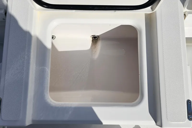  Yacht Photos Pics Open storage compartment on 2021 Everglades 273 Center Console boat.