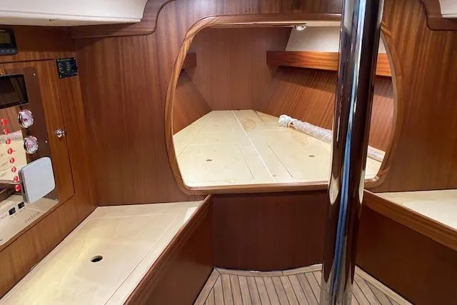  Yacht Photos Pics Interior of 2022 Leonardo Yachts Eagle 44, featuring elegant wood finish and spacious cabin.