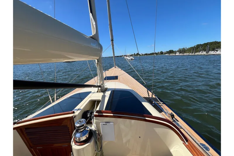  Yacht Photos Pics 2022 Leonardo Yachts Eagle 44 sailing on a sunny day, showcasing sleek deck design.