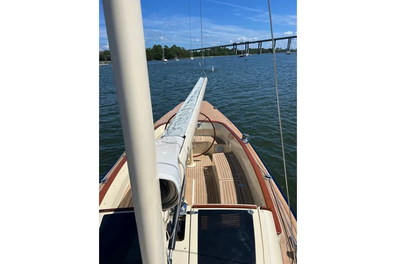  Yacht Photos Pics 2022 Leonardo Yachts Eagle 44 sailboat on calm water, featuring elegant wooden deck design.