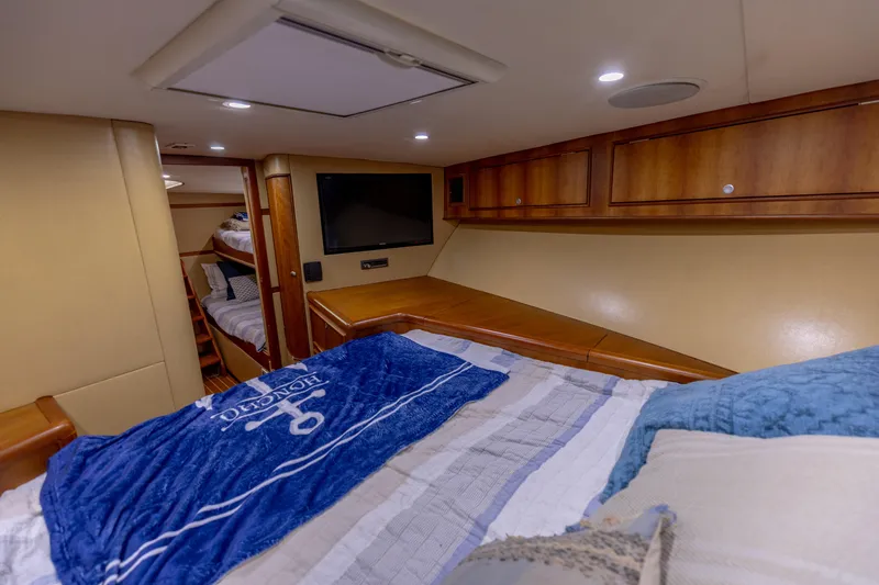 Honcho Yacht Photos Pics Luxurious cabin interior of 2000 Custom Carolina Alex Willis Convertible yacht.