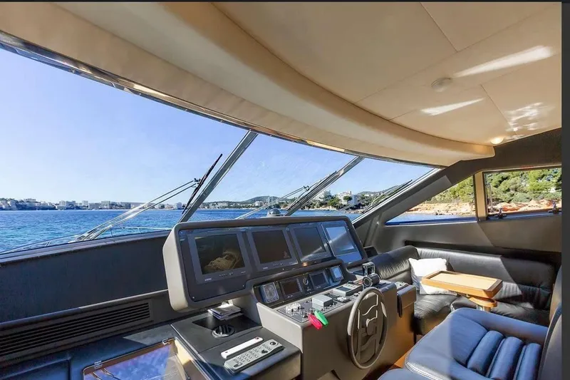  Yacht Photos Pics Luxurious 2005 Ferretti 731 yacht interior with modern helm and scenic ocean view.