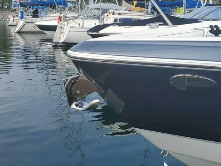  Yacht Photos Pics 2017 Formula 310SS boat docked in marina, surrounded by other vessels.