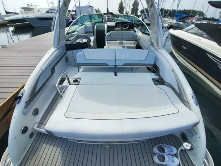  Yacht Photos Pics 2017 Formula 310SS boat with spacious deck and seating at marina.