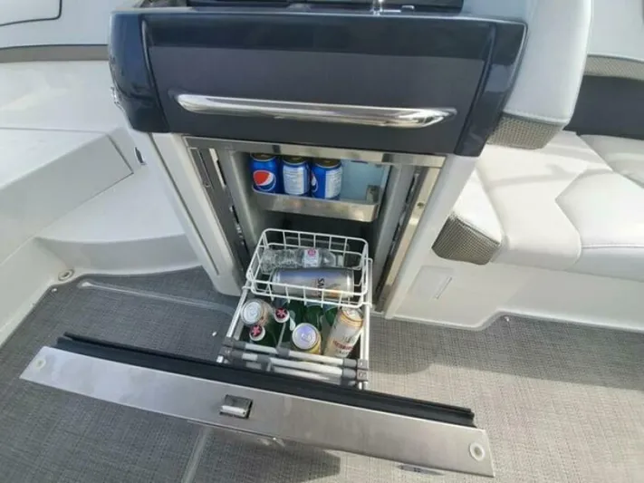  Yacht Photos Pics Built-in boat cooler with drinks, Formula 310SS, 2017 model.