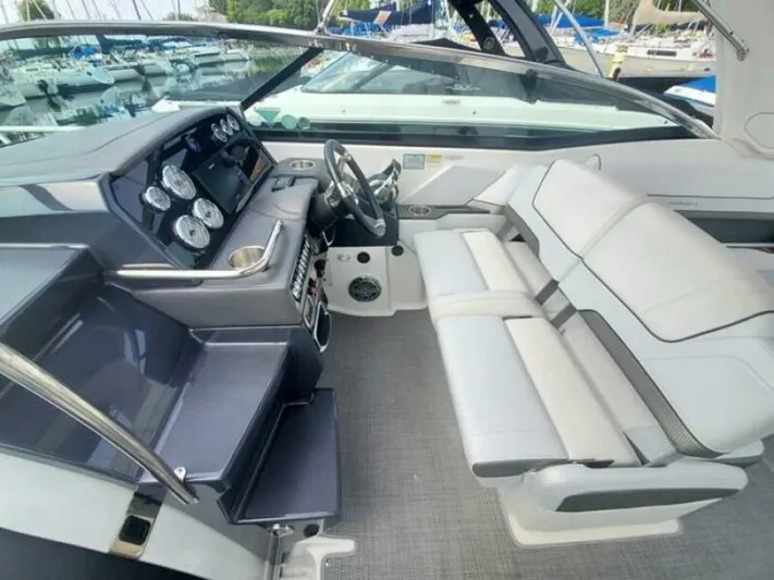  Yacht Photos Pics 2017 Formula 310SS boat interior with sleek dashboard and comfortable seating.