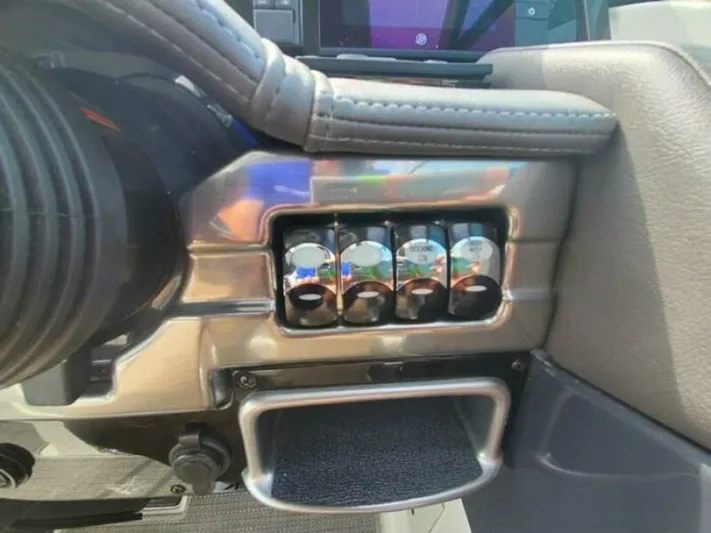  Yacht Photos Pics Control panel of a 2017 Formula 310SS boat with chrome switches.