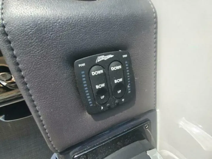  Yacht Photos Pics Control panel on a 2017 Formula 310SS boat, featuring bow and port adjustments.