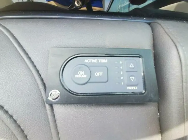  Yacht Photos Pics Control panel of a 2017 Formula 310SS boat with active trim settings.