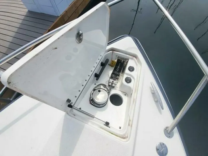  Yacht Photos Pics Open hatch on 2017 Formula 310SS boat, showing anchor storage compartment.