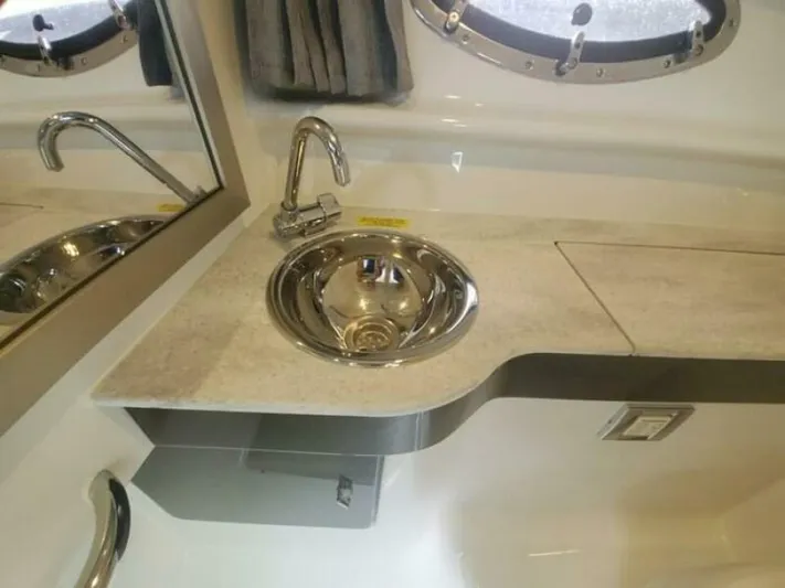  Yacht Photos Pics 2017 Formula 310SS yacht bathroom with sleek sink and modern fixtures.