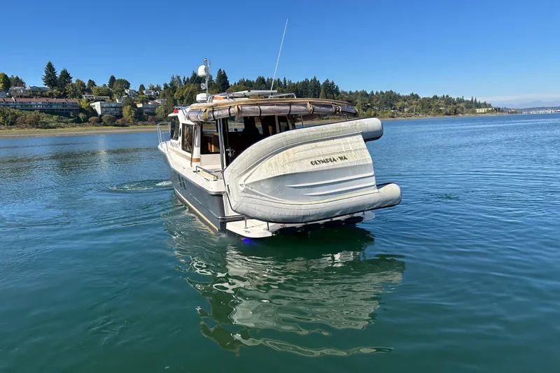 Two For The Road II Yacht Photos Pics 2020 Ranger Tugs R-29 boat on calm water, Olympia, WA.