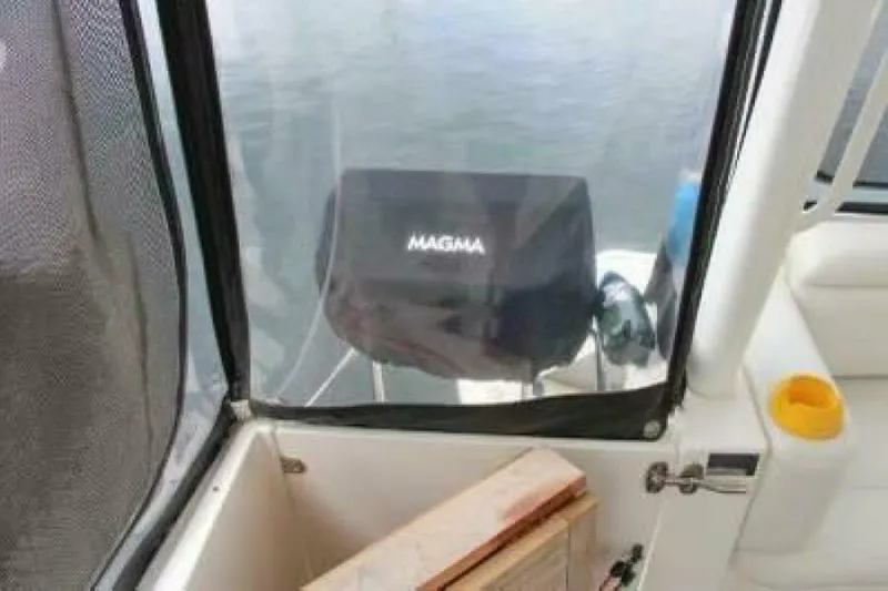  Yacht Photos Pics 2004 Silverton 35 Motor Yacht interior with Magma grill on deck.