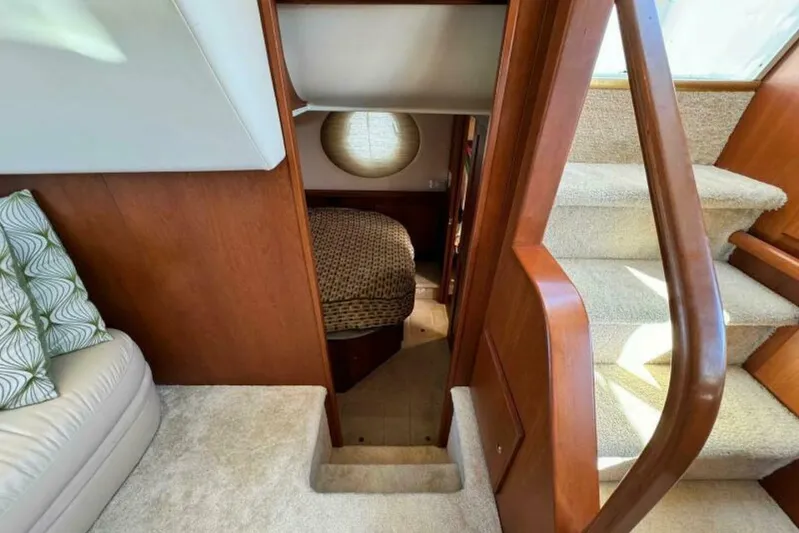  Yacht Photos Pics Interior of 2004 Silverton 35 Motor Yacht with stairs and cozy cabin.