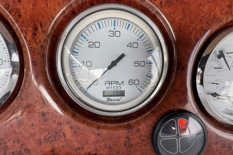  Yacht Photos Pics RPM gauge on 2004 Silverton 35 Motor Yacht dashboard, showing 3916 hours.