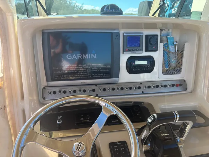  Yacht Photos Pics 2013 Scout 282 XSF helm with Garmin navigation system.