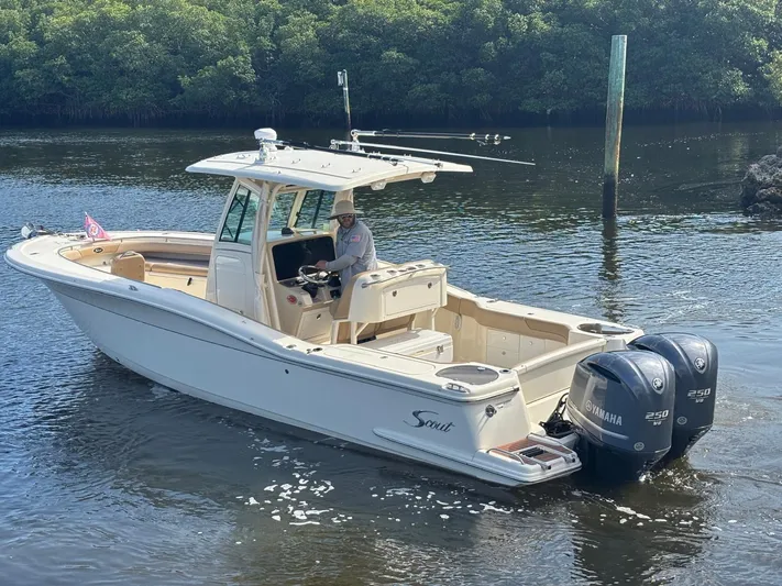  Yacht Photos Pics 2013 Scout 282 XSF boat on calm water with dual Yamaha engines.