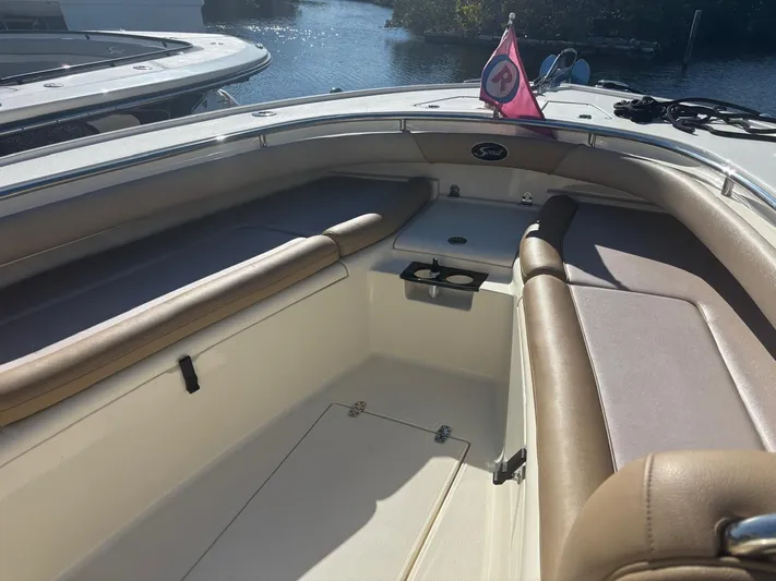  Yacht Photos Pics Interior of a 2013 Scout 282 XSF boat with seating area.