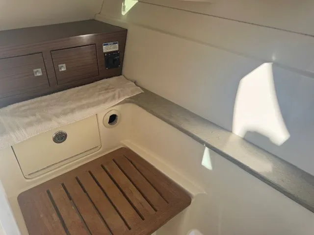  Yacht Photos Pics Interior of 2016 Boston Whaler 320 Vantage with wood accents.