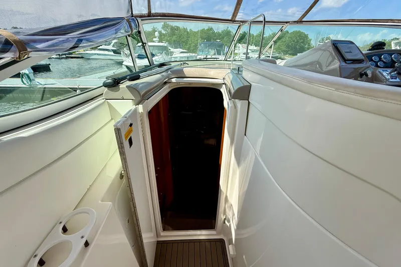  Yacht Photos Pics 2004 Cruisers Yachts 3672 interior entrance with marina view in background.