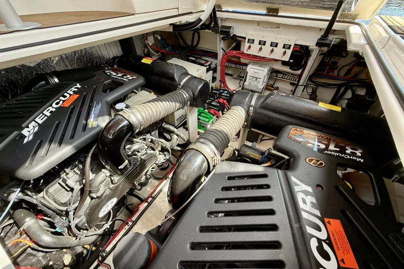  Yacht Photos Pics Engine compartment of a 2004 Cruisers Yachts 3672 with Mercury engines.