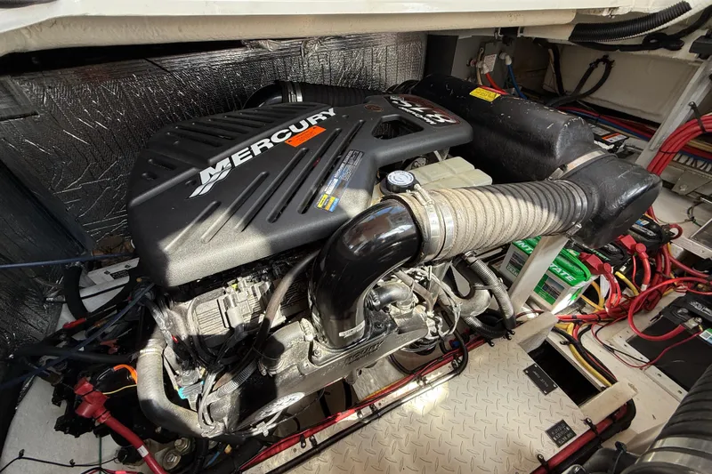  Yacht Photos Pics Engine compartment of a 2004 Cruisers Yachts 3672 with a Mercury engine.
