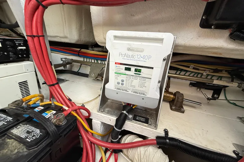  Yacht Photos Pics Engine room of 2004 Cruisers Yachts 3672 with ProNautic 12-40P battery charger.