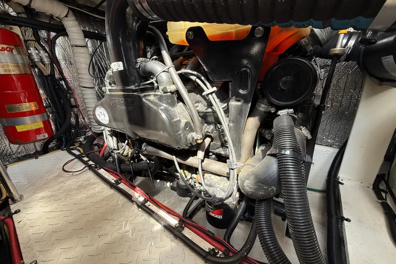  Yacht Photos Pics Engine room of a 2004 Cruisers Yachts 3672, featuring a Mercury MerCruiser engine.