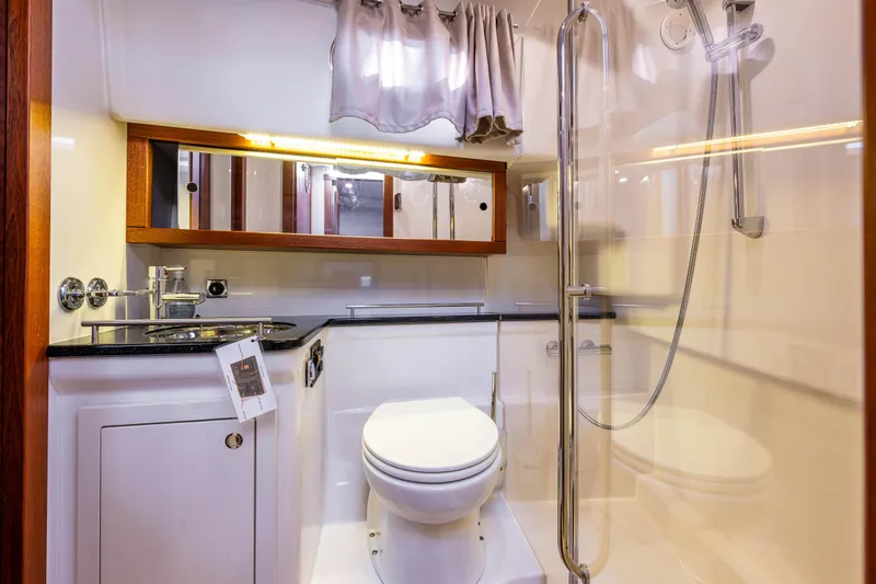 Keokuk Yacht Photos Pics Luxurious bathroom in 2020 Nimbus 365 Coupe yacht with modern fixtures and shower.