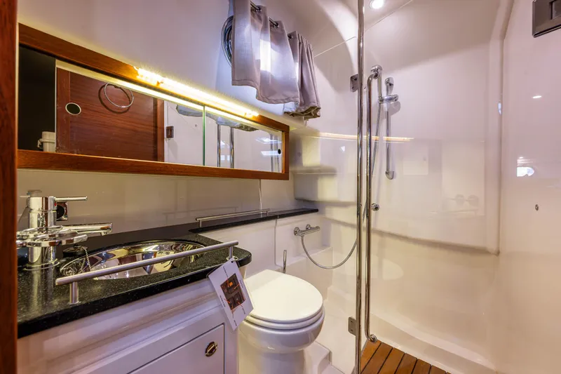 Keokuk Yacht Photos Pics Luxurious bathroom in 2020 Nimbus 365 Coupe yacht with modern fixtures and shower.