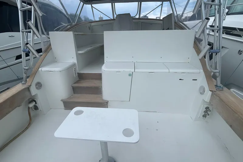  Yacht Photos Pics 1993 Buddy Davis 38 Express boat interior with seating and table.