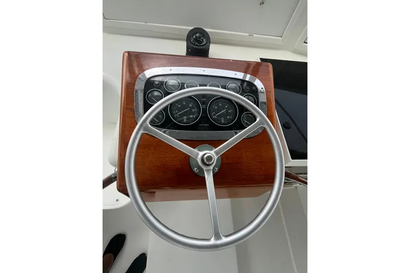  Yacht Photos Pics Steering wheel and dashboard of 1993 Buddy Davis 38 Express boat.